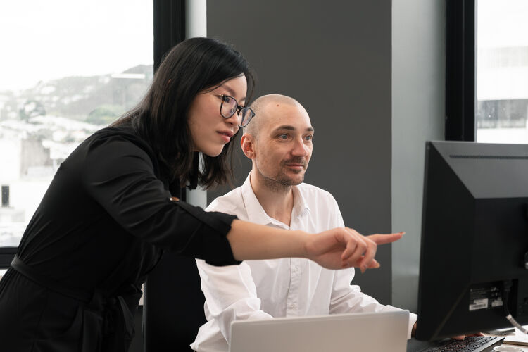 Working together in front of a computer