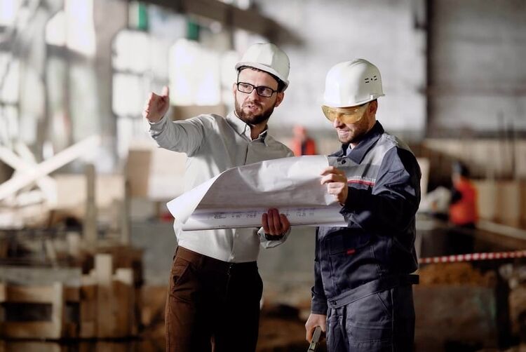 Civil Engineers Discussing Plans