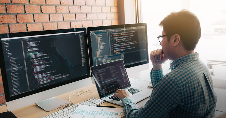 Developer in front of a computer