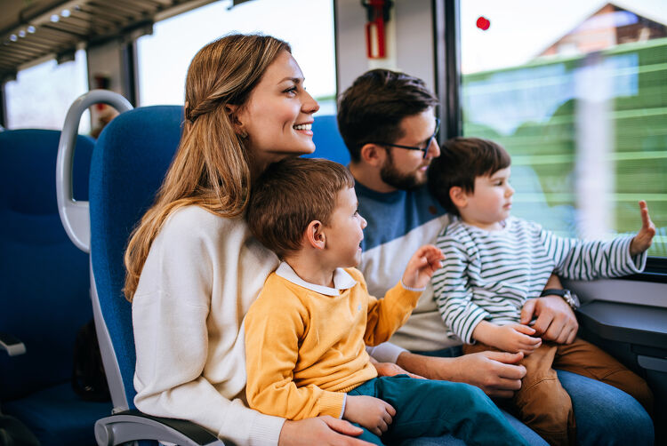 Family Taking a Trip on a Train