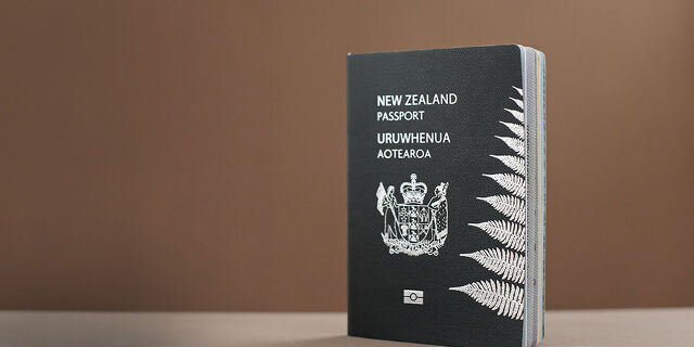 New Zealand Passport Standing on Table