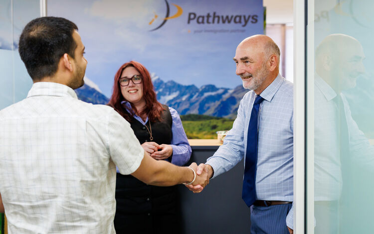 Shaking hands in the Pathways office